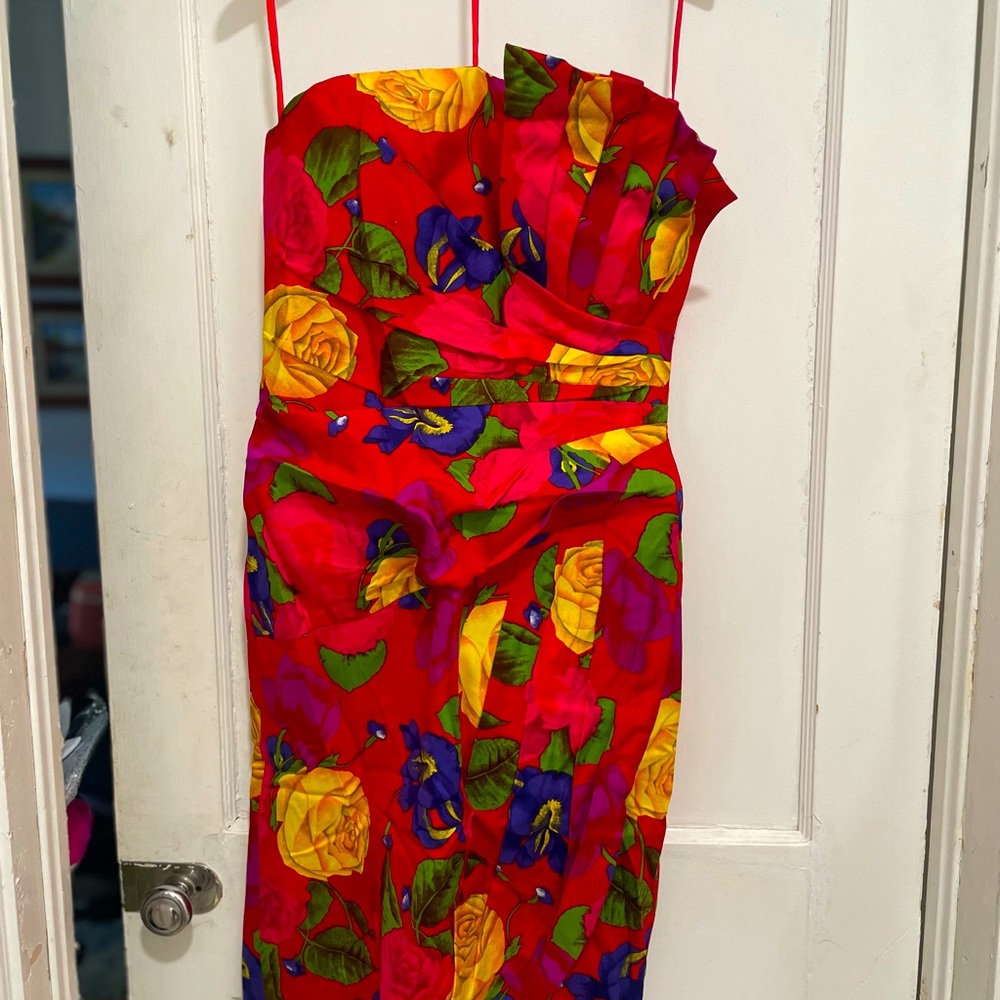 Strapless cocktail floral dress. Size 10
Boned to the waist